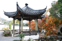 A Chinese pavilion, or 'xie' with the distinctive upturned tile roof. 